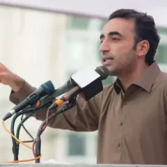 PPP Chairman Bilawal Bhutto Zardari speaking passionately at a political rally mic in Muzaffarabad
